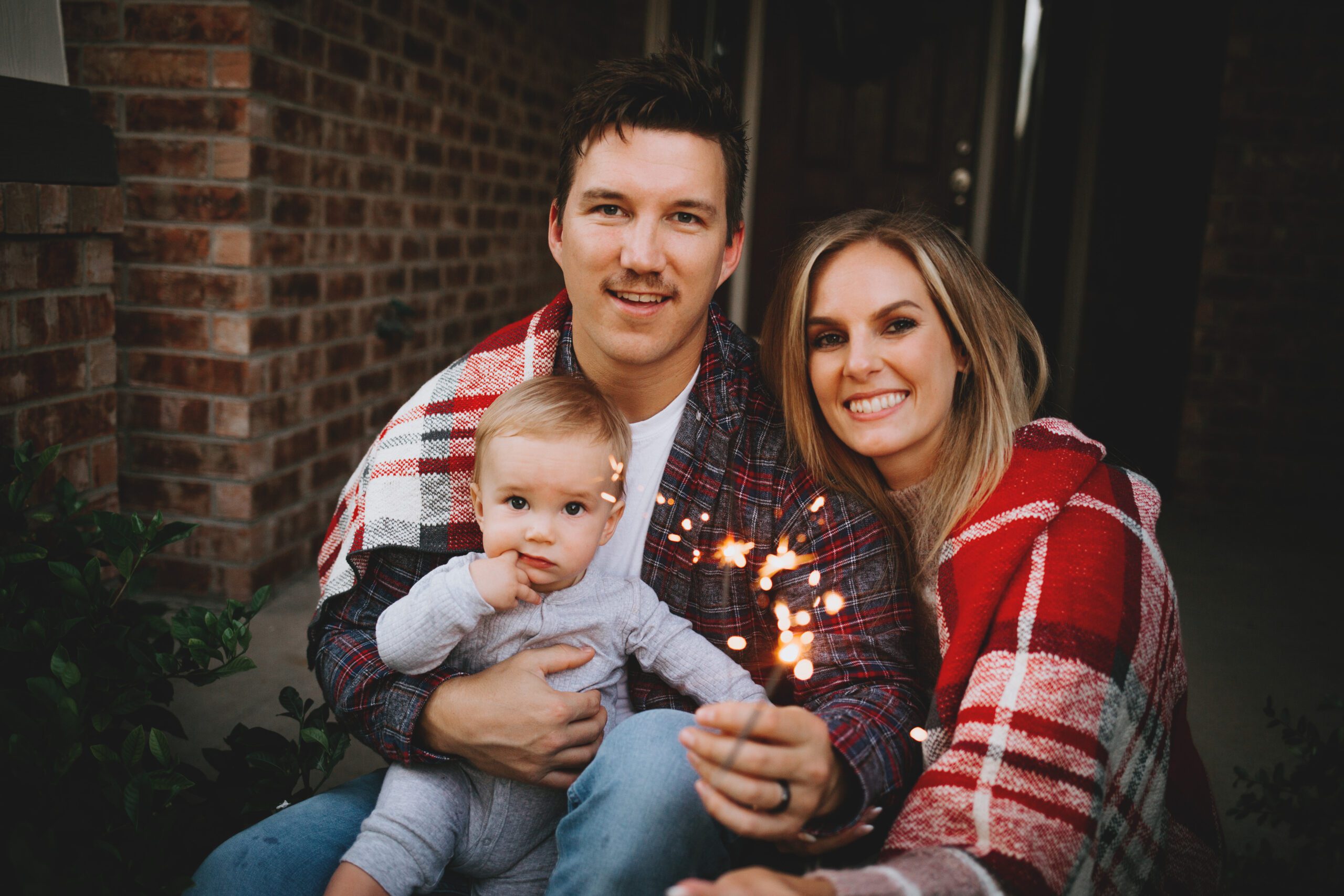 Family Celebrating at Home with Sparklers